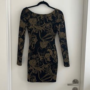 black and gold glitter long sleeved low back dress